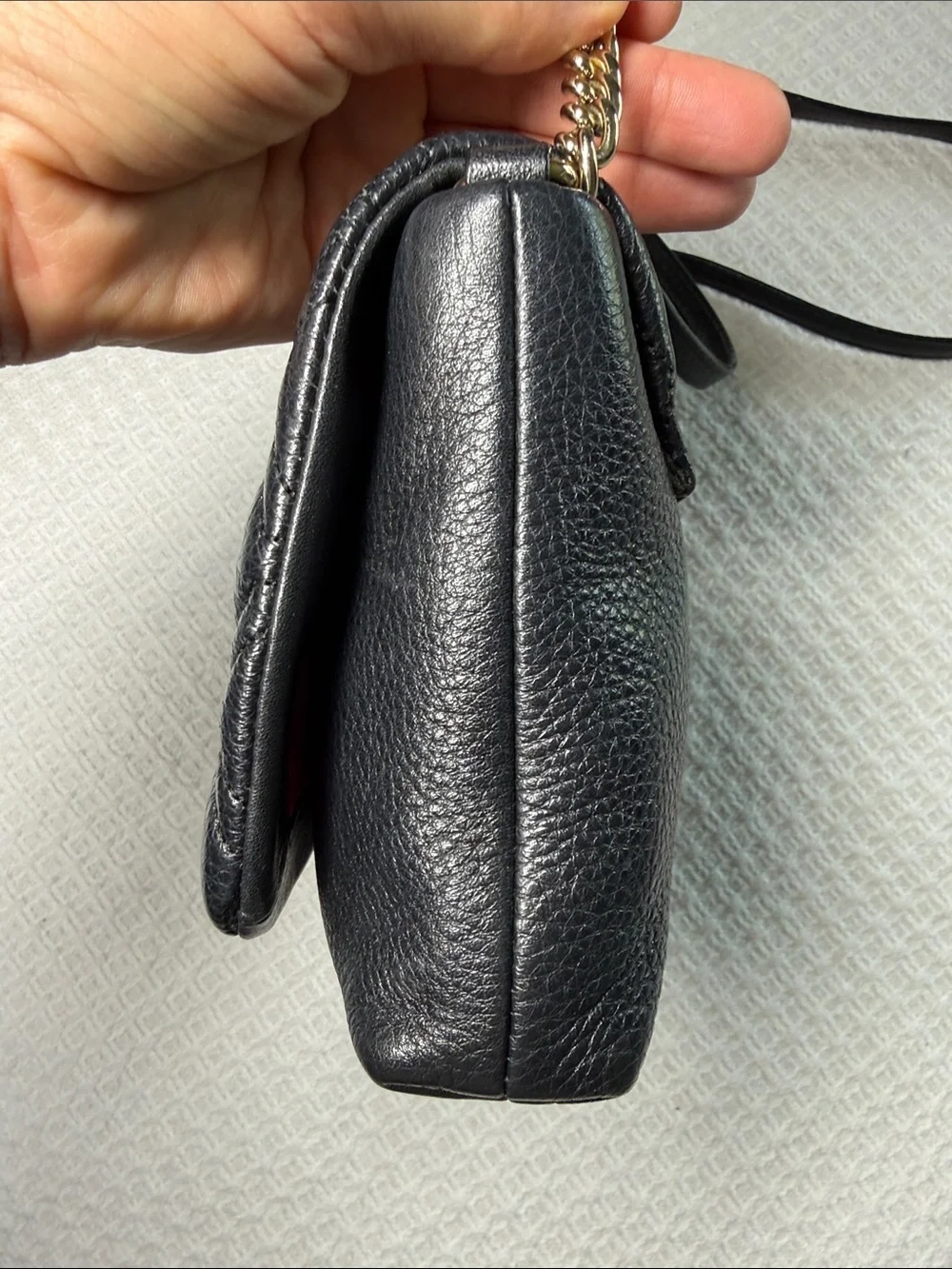 Kate Spade black quilted leather crossbody bag with gold chain and hardware